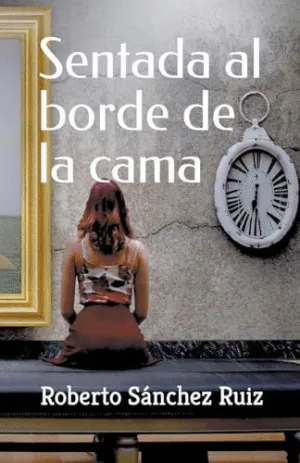 SENTADA AL BORDE DE LA CAMA.
